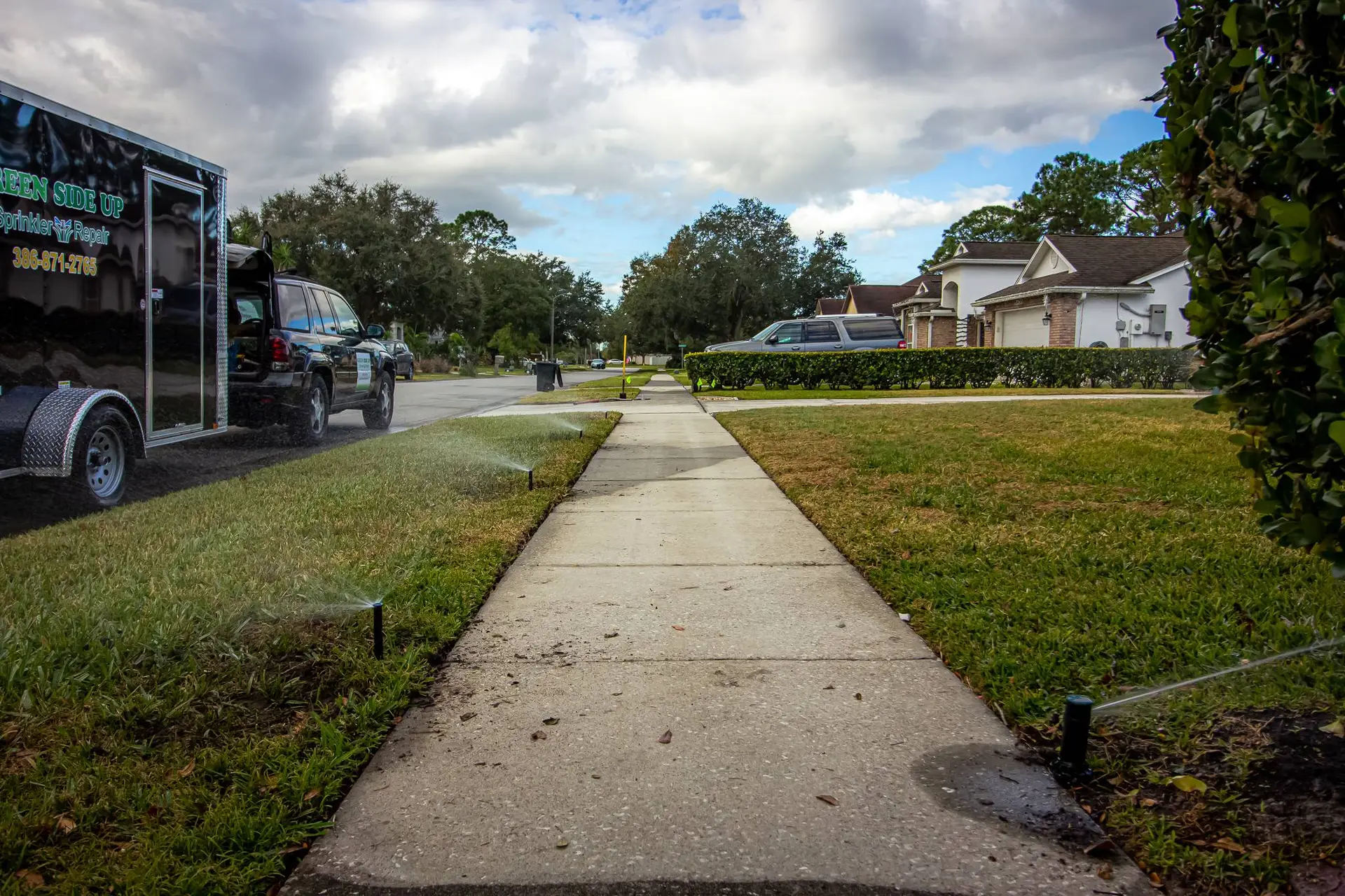 Green side up Sprinkler Repair truck Your Sprinkler Repair Experts - Volusia County